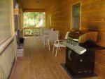 Screened in Upper Deck off the Kitchen with BBQ Gas Grill and 2 patio tables with 8 chairs